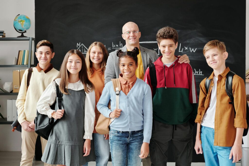 Middle school students with their teacher in a Michigan classroom